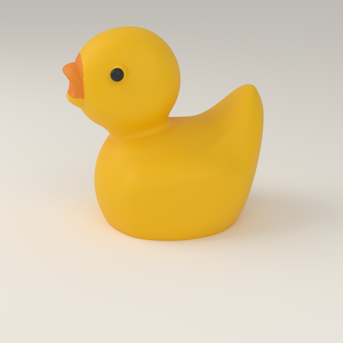 A single yellow 3D-printed hunt duck showing its smooth rounded shape